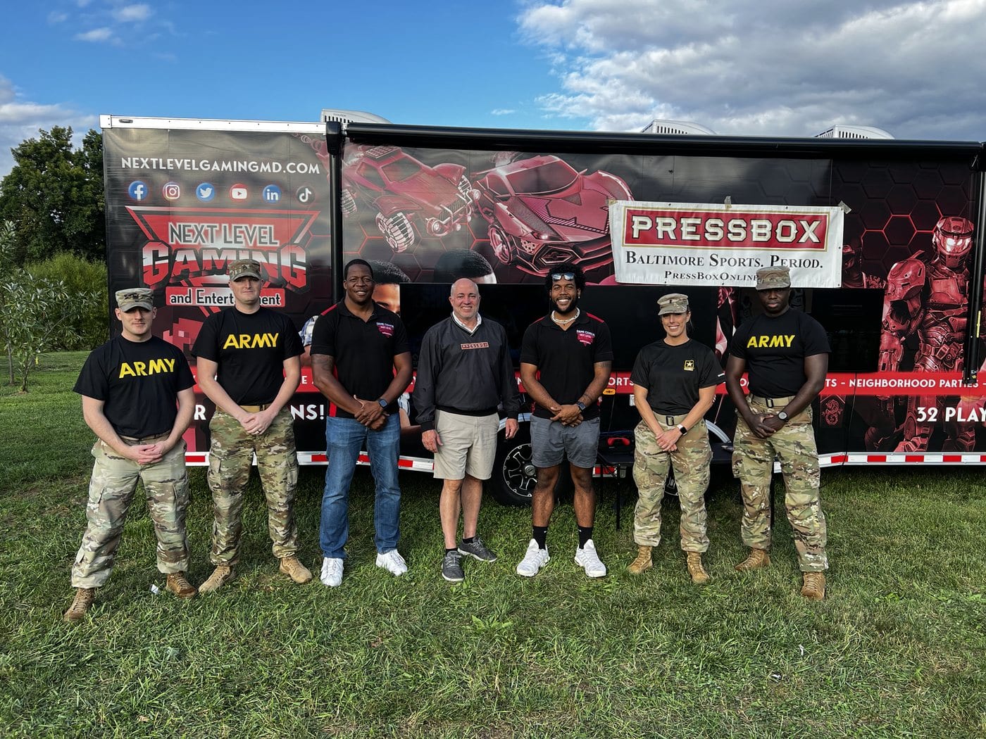 Adults and staff at a Next Level Gaming community and corporate event in the DMV
